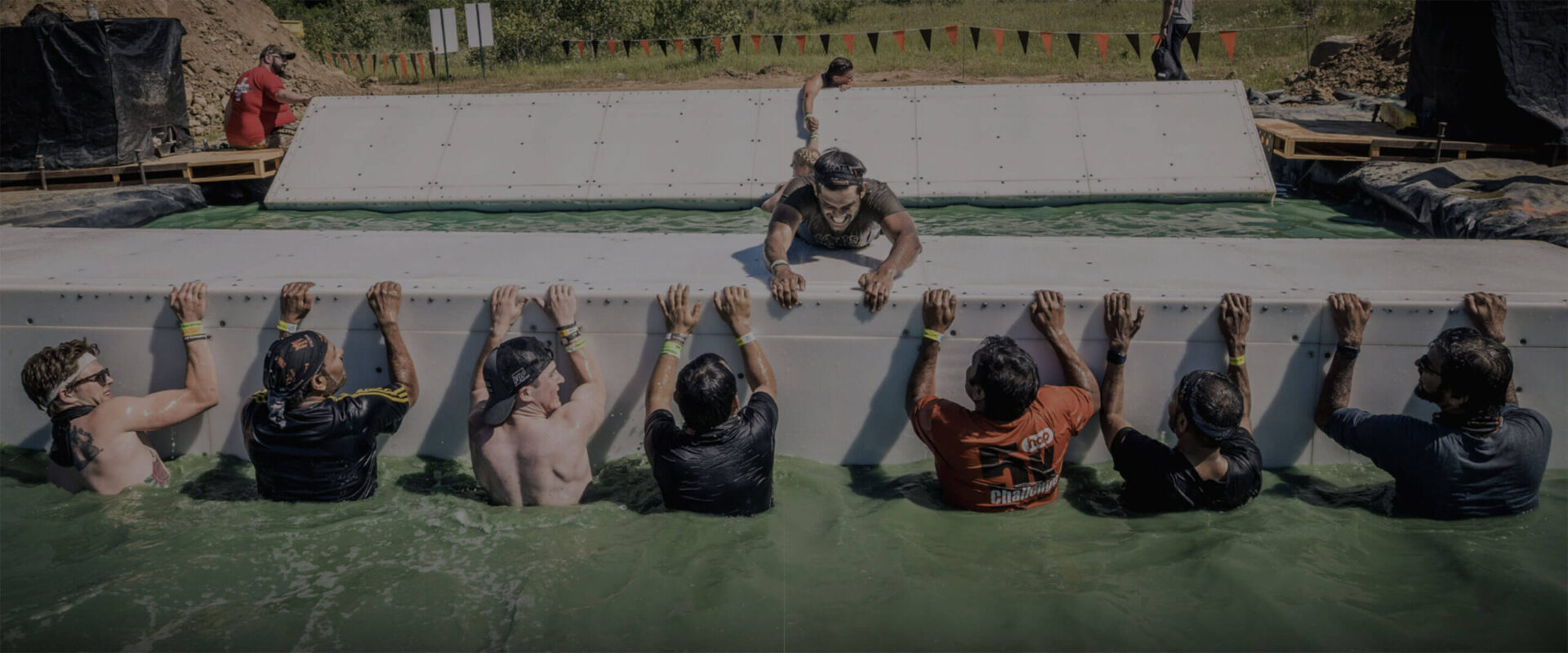 Participants trying to flip the block on The Block Ness Monster